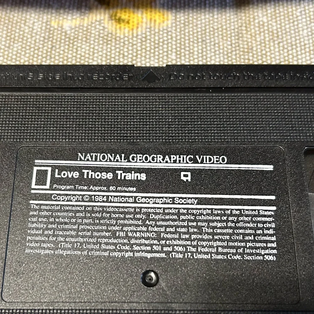 Vintage VHS National Geographic videotape “love those trains”. ￼